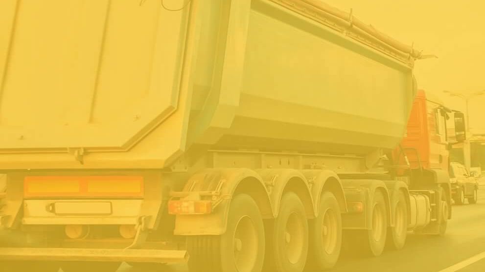 Gravel truck hauling aggregate load on highway. Affected Comal County roads include FM 3009, SH 46, FM 1863, Beck Road, US Highway 281, FM 311, FM 3159, and Loop 337.