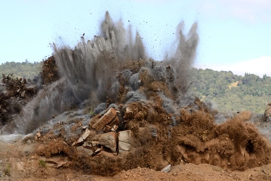 Dust created by blasting in rock quarry similar to planned Vulcan Materials quarry in Comal County