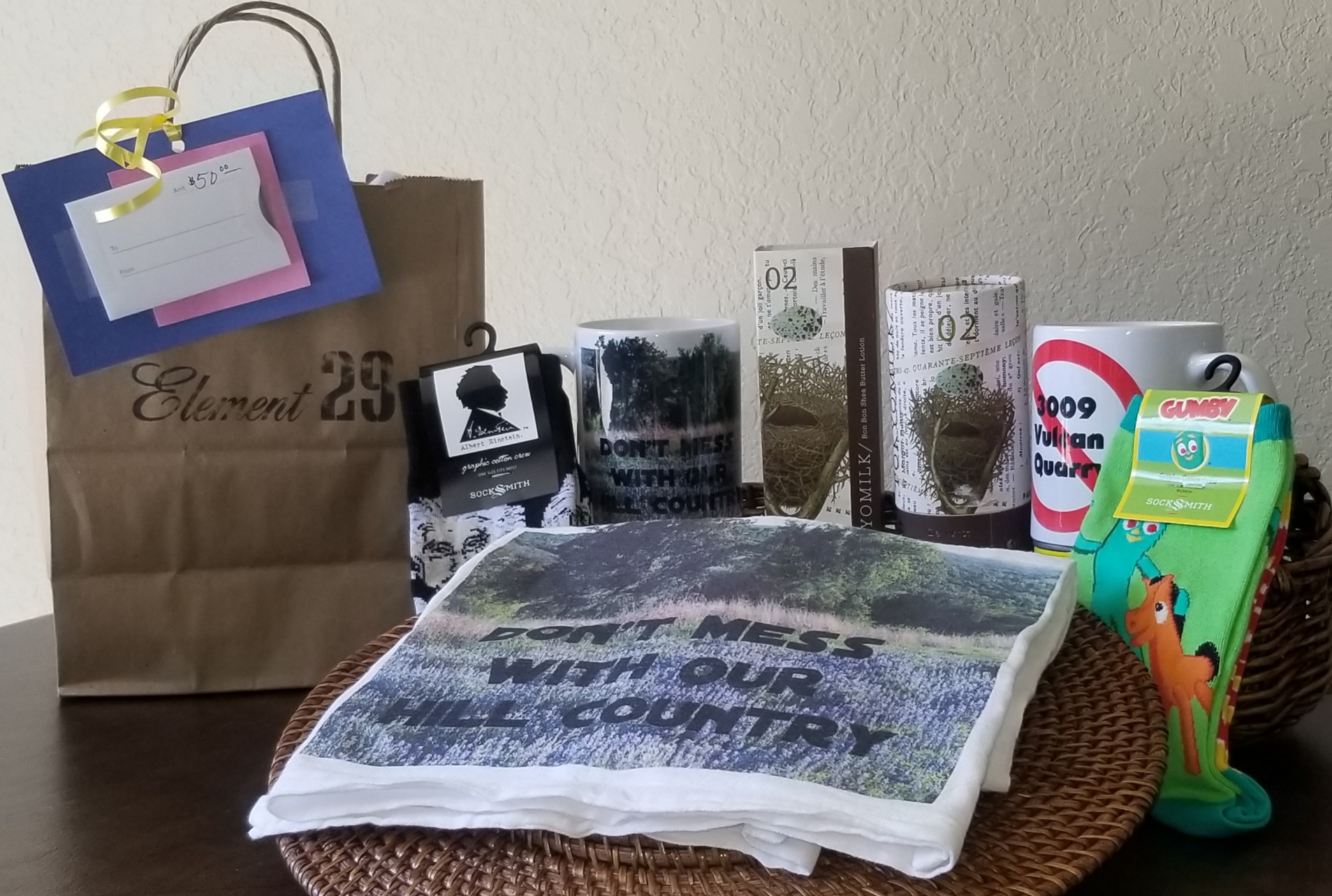 Online Secret Auction: Shop Til You Drop: Element 29 Gift Bag including Stop 3009 Vulcan Mugs, Cheese cloth, fun socks, TokyoMilk parfum and lotion with $50 Gift Certificate